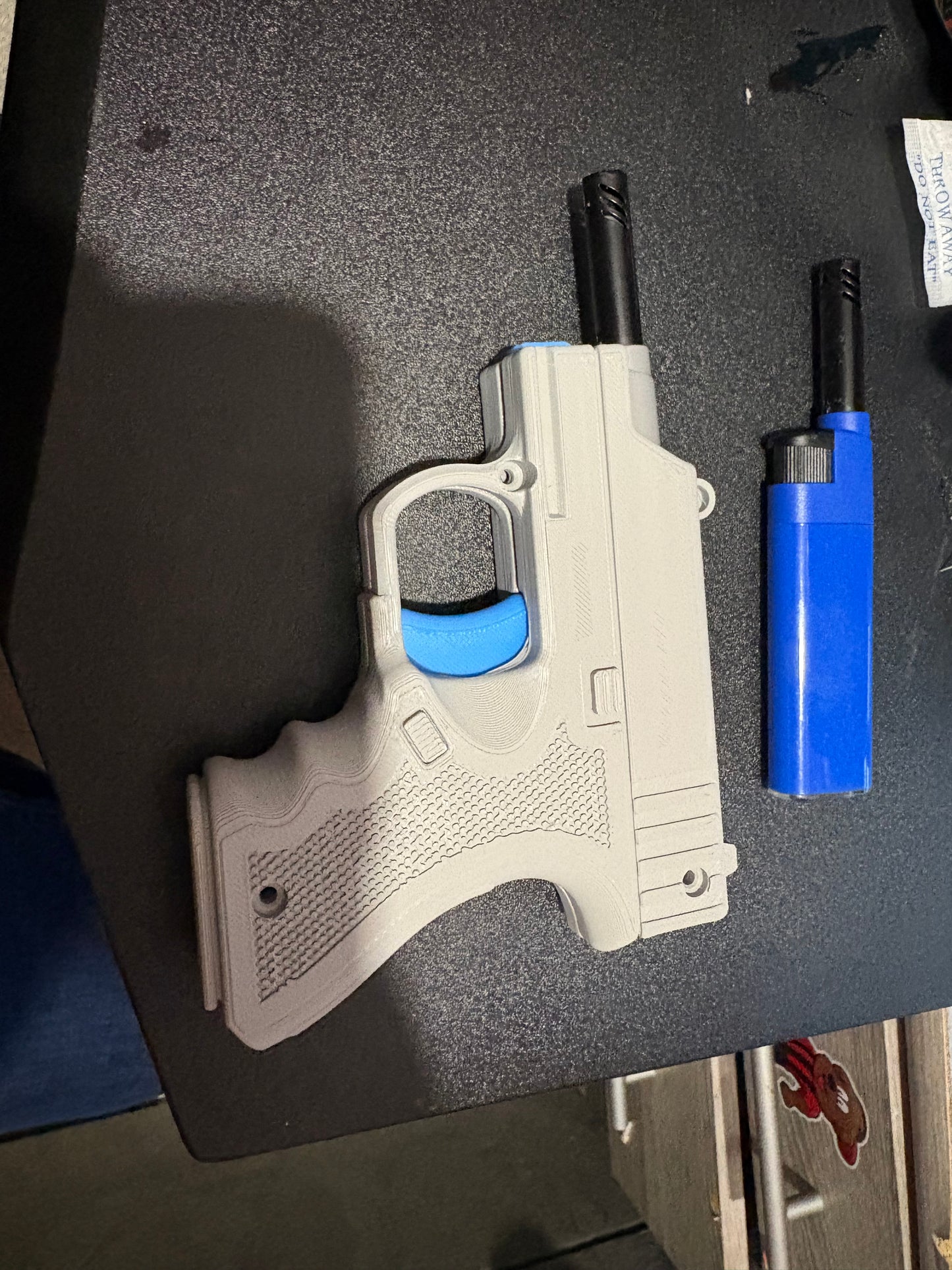 Novelty gun lighter
